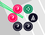 Esta imagen muestra los servicios individuales en esta ubicación. Cada servicio se representa como un disco de color con  un símbolo que representa el tipo de servicio. Los discos de colores están dispuestos en un círculo. En este ejemplo, hay dos puertos rojos, dos puertos negros, un MVE verde y un disco negro que representa la ubicación.